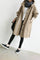 Cappotto lungo da donna con cappuccio e bottoni classici