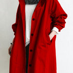 Cappotto lungo da donna con cappuccio e bottoni classici