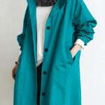 Cappotto lungo da donna con cappuccio e bottoni classici