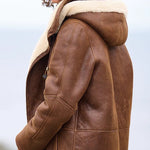 Cappotto da donna con cappuccio e alamari