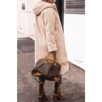 Cappotto lungo trapuntato da donna con cappuccio