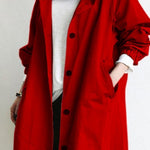 Trench lungo da donna con cappuccio e bottoni