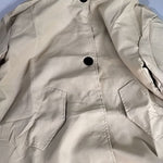 Trench lungo da donna con cappuccio e bottoni