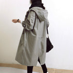 Trench lungo da donna con cappuccio e bottoni