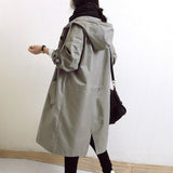 Trench lungo da donna con cappuccio e bottoni