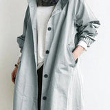 Trench lungo da donna con cappuccio e bottoni