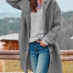 Cappotto lungo da donna con cappuccio e bottoni