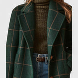 Cappotto lungo elegante da donna in tweed a quadri