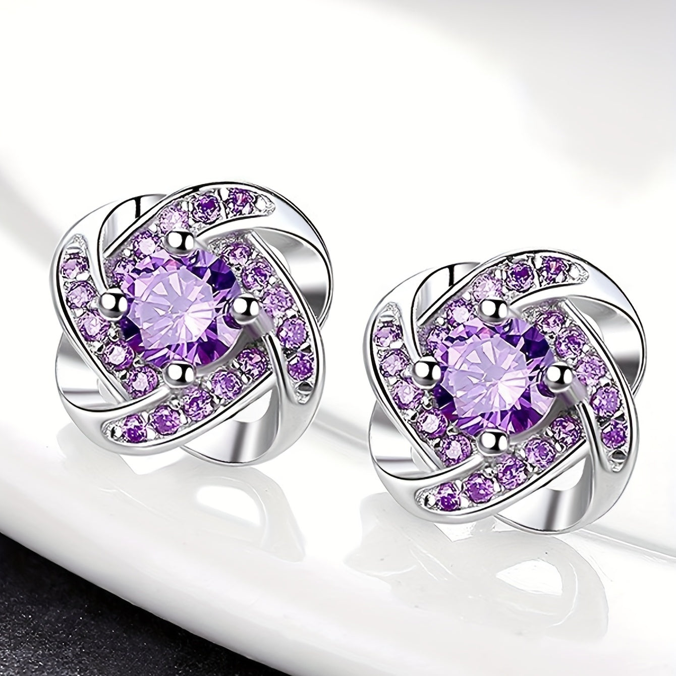 Orecchini viola a quadrifoglio – Immagine 1